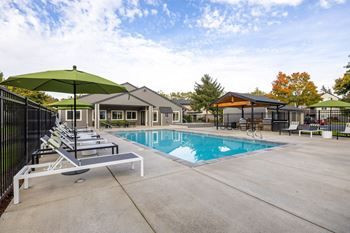 Seasonal outdoor heated pool, spa & sun deck area